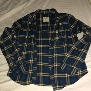 Navy blue and yellow striped flannel